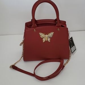 Crossi NY Handbag with Butterfly Emblem